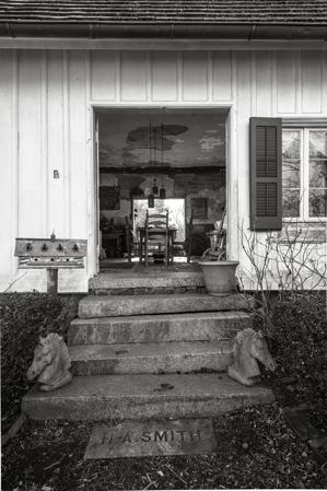 Rear stairs to carriage room